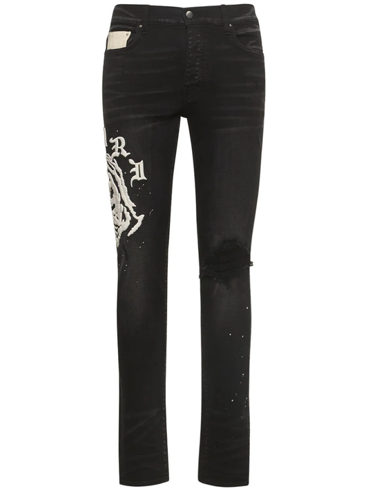 Amiri Wes Lang Reaper Logo Aged Jeans in Black