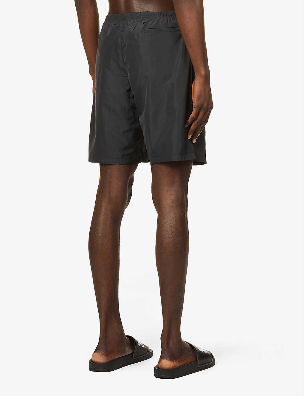 Palm Angels Curved Logo Swim Shorts in Black